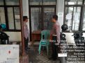 Polsek Kenjeran Pastikan Keamanan Kotak Suara di PPK Bulak Jalan Kyai Tambak Deres