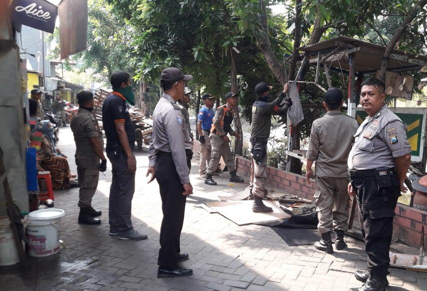 Babinkamtimas Polsek Semampir Kawal Penertiban Bangli