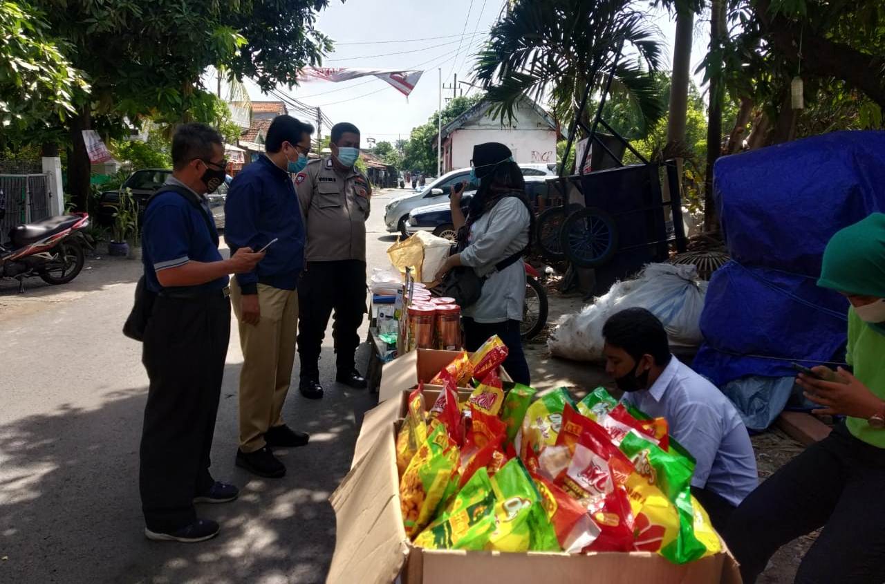 Babinkamtibmas Ujung Lakukan Pengamanan Operasi Pasar Murah