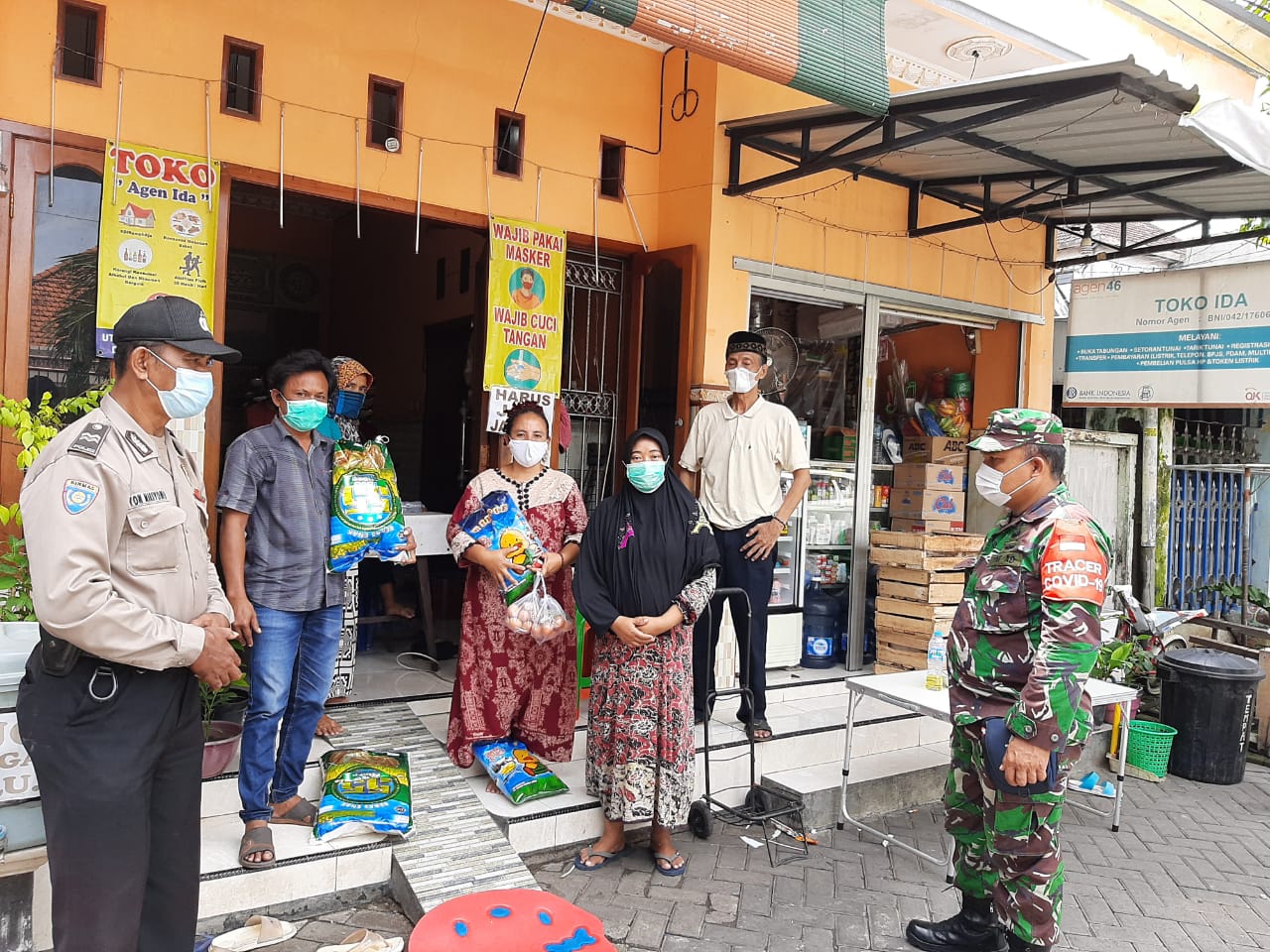 Babinkamtibmas Perak Timur Lakukan PAM Pengambilan Bantuan Sembako