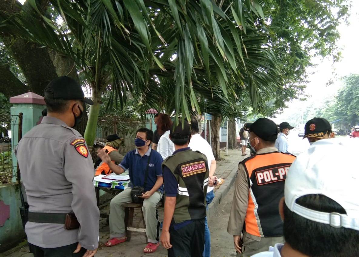 Polsek Kenjeran Gelar Operasi Penertiban Masker Bersama Instansi Samping di Jalan Wiratno, Jaring 12 Pelanggar