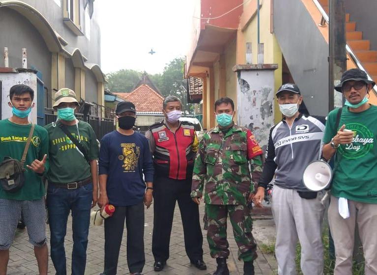 Babinkamtibmas Perak Utara Sosialisasi Pencegahan Penyebaran Virus Corona Bersama Komunitas Bonek