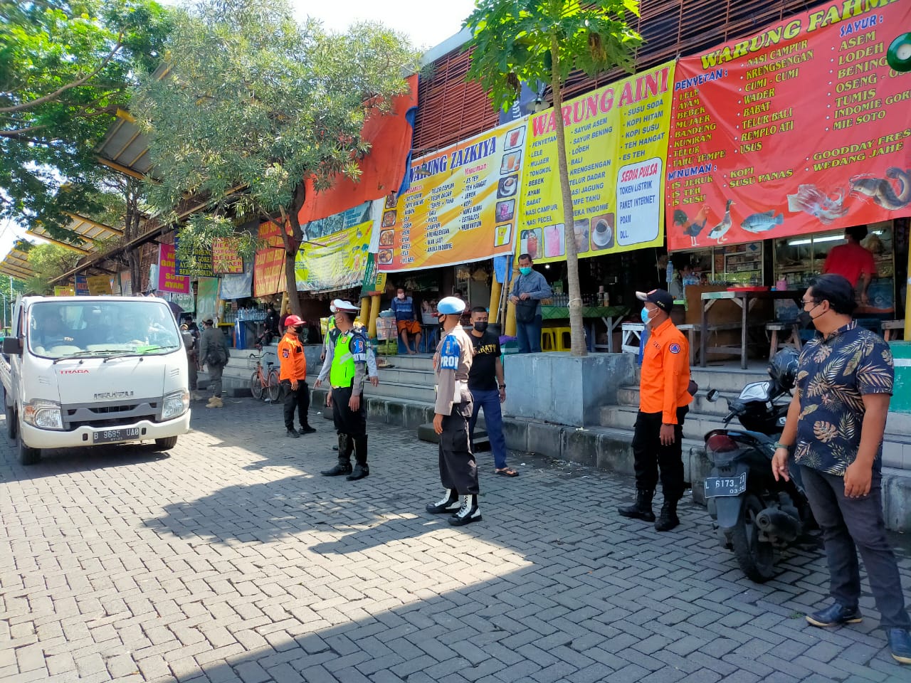 Gelar Operasi Yustisi Sekaligus Bagikan Masker, Wujud Polres Pelabuhan Tanjung Perak Cegah Penyebaran Covid-19